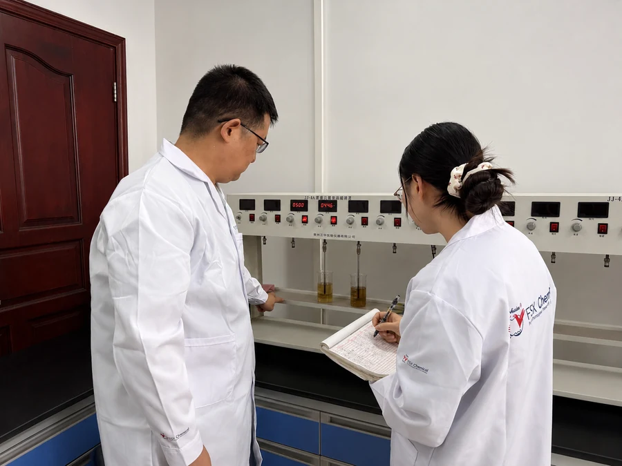 FSX laboratory team recording test results during product evaluation